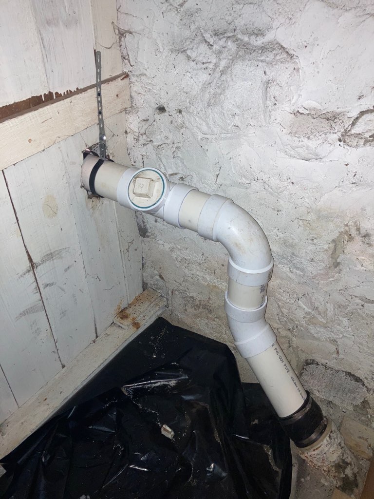 PVC drain pipe repair in Rhode Island basement