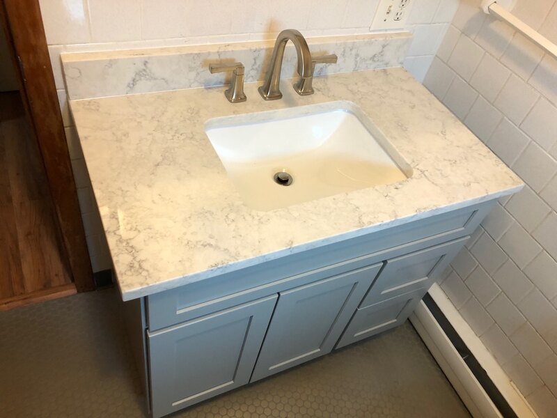 New bathroom vanity and faucet installed by Anne the Plumber